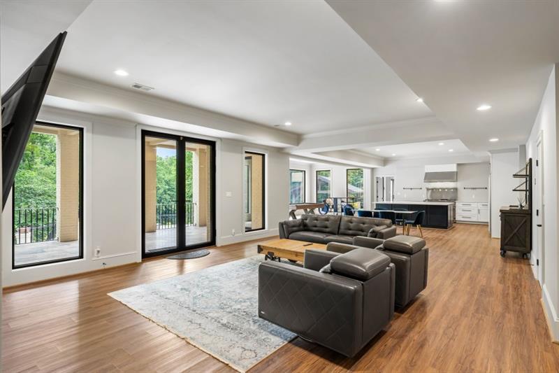 1430 North Harris Ridge Northwest Atlanta, GA 30327 - Photo 40 of 60 a living room with furniture and a large window