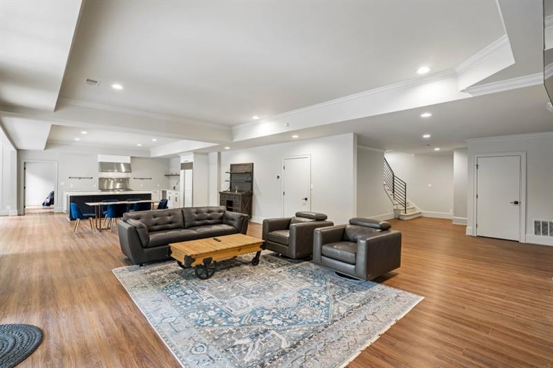 1430 North Harris Ridge Northwest Atlanta, GA 30327 - Photo 41 of 60 a living room with furniture and wooden floor