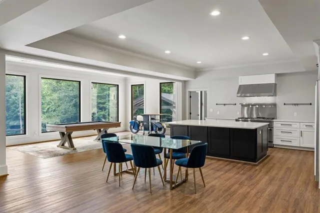 a bathroom with a shower and a sink