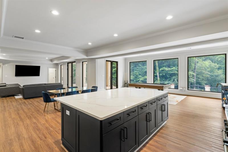 1430 North Harris Ridge Northwest Atlanta, GA 30327 - Photo 44 of 60 a large white kitchen with a large window