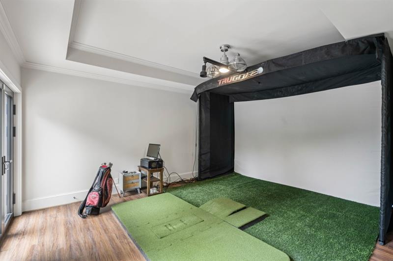 1430 North Harris Ridge Northwest Atlanta, GA 30327 - Photo 45 of 60 a view of a room with gym equipment