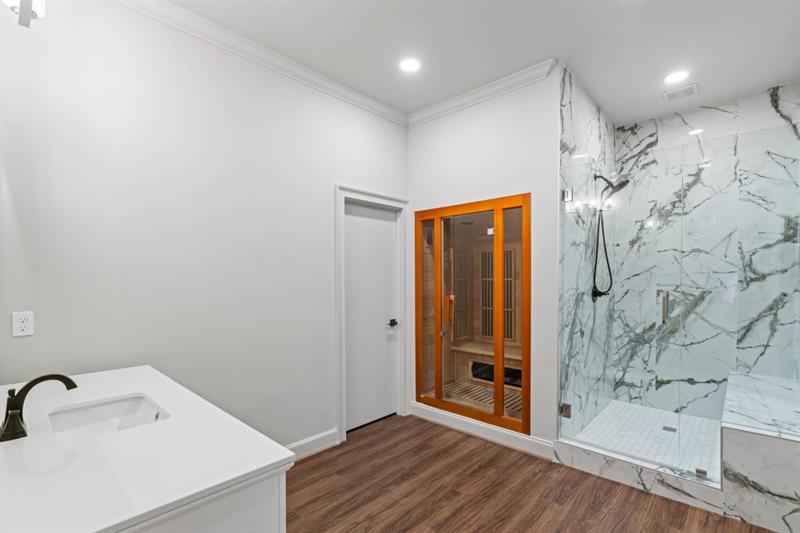 1430 North Harris Ridge Northwest Atlanta, GA 30327 - Photo 48 of 60 a bathroom with a shower and a sink