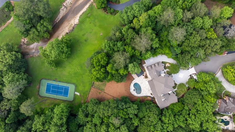 1430 North Harris Ridge Northwest Atlanta, GA 30327 - Photo 59 of 60 an aerial view of a house with outdoor space and street view