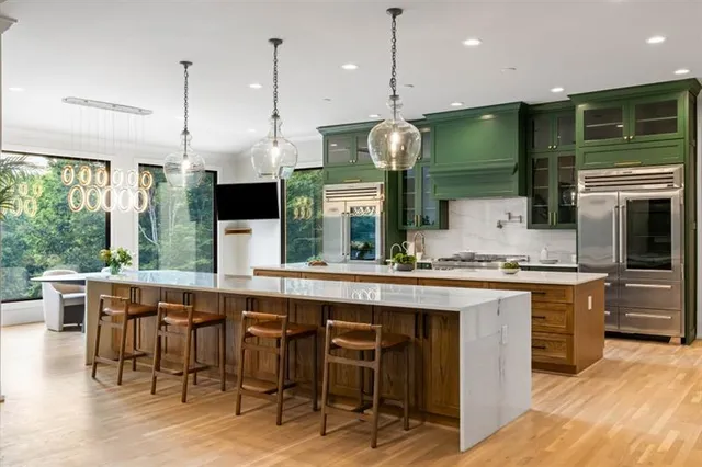 a kitchen with a stove and a sink