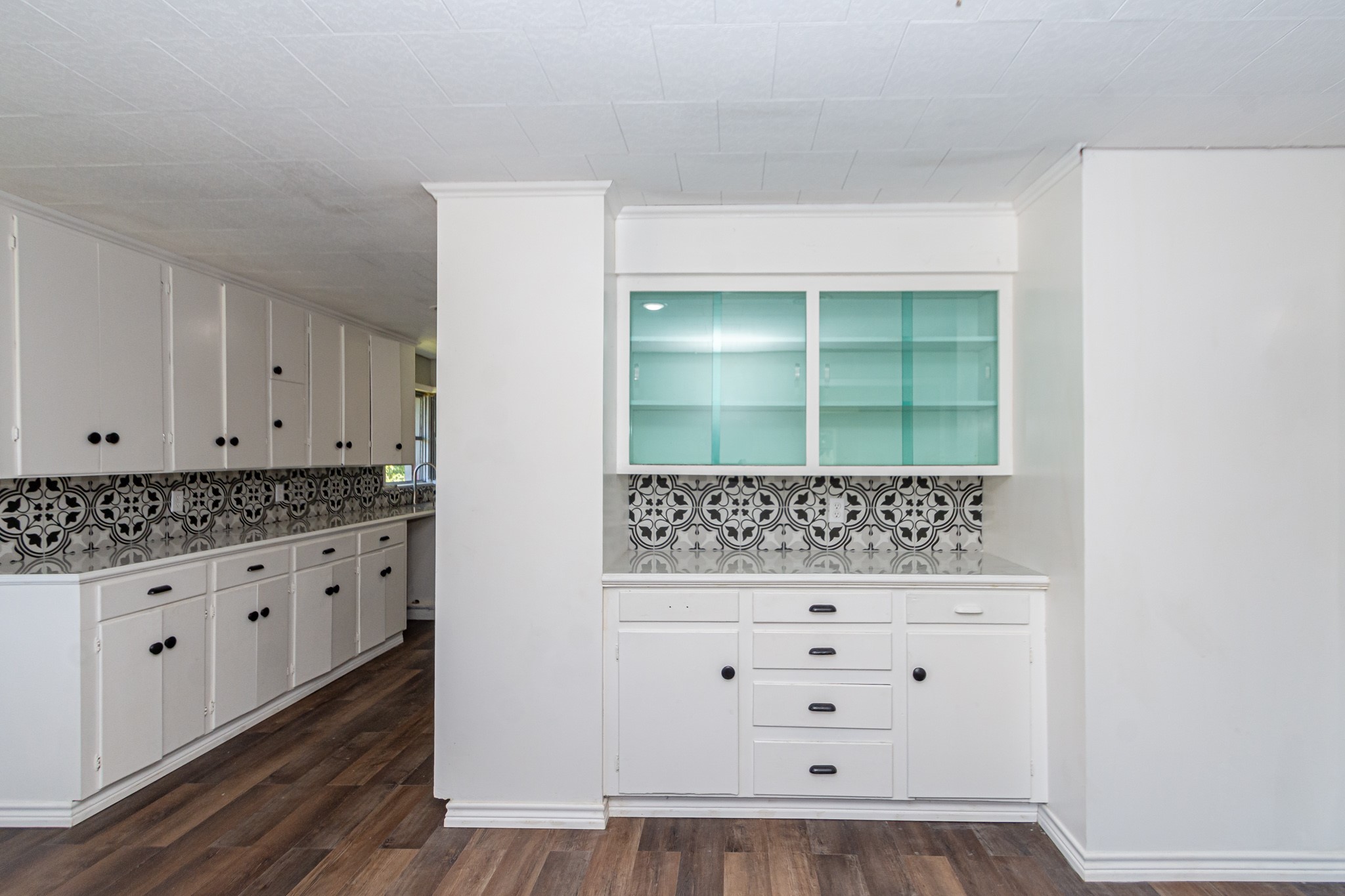 1230 West 4th Street Freeport, TX 77541 - Photo 22 of 49 Beautiful kitchen with gorgeous built in China cabinet. Look at all the cabinets.