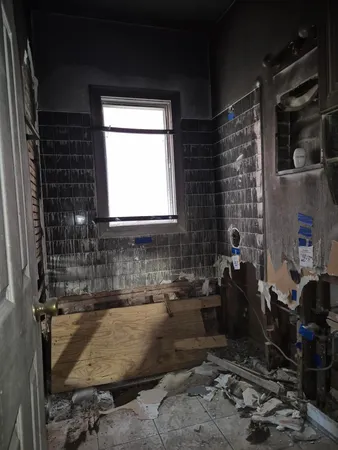 an empty room with windows