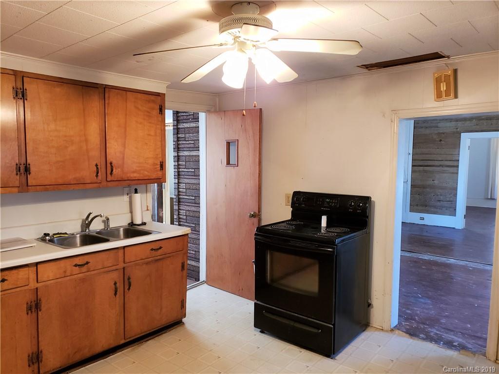 8131 Oak Tree Road Sharon, SC 29742 - Photo 20 of 36 a kitchen with sink cabinets and appliances