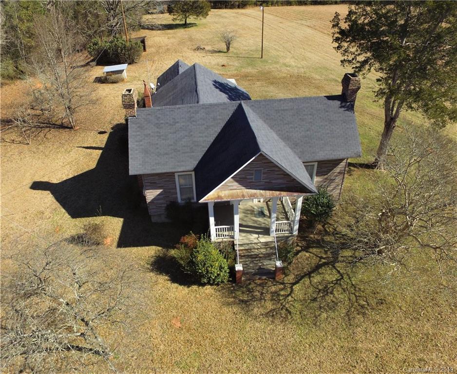 8131 Oak Tree Road Sharon, SC 29742 - Photo 3 of 36 a house with trees in the background