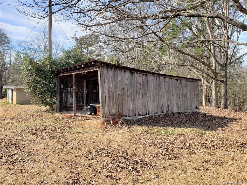 8131 Oak Tree Road Sharon, SC 29742 - Photo 28 of 36 a backyard of a house with lots of green space
