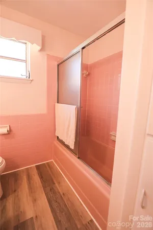 a bathroom with a sink and a shower