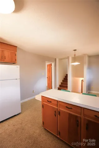 a room with a sink and a mirror