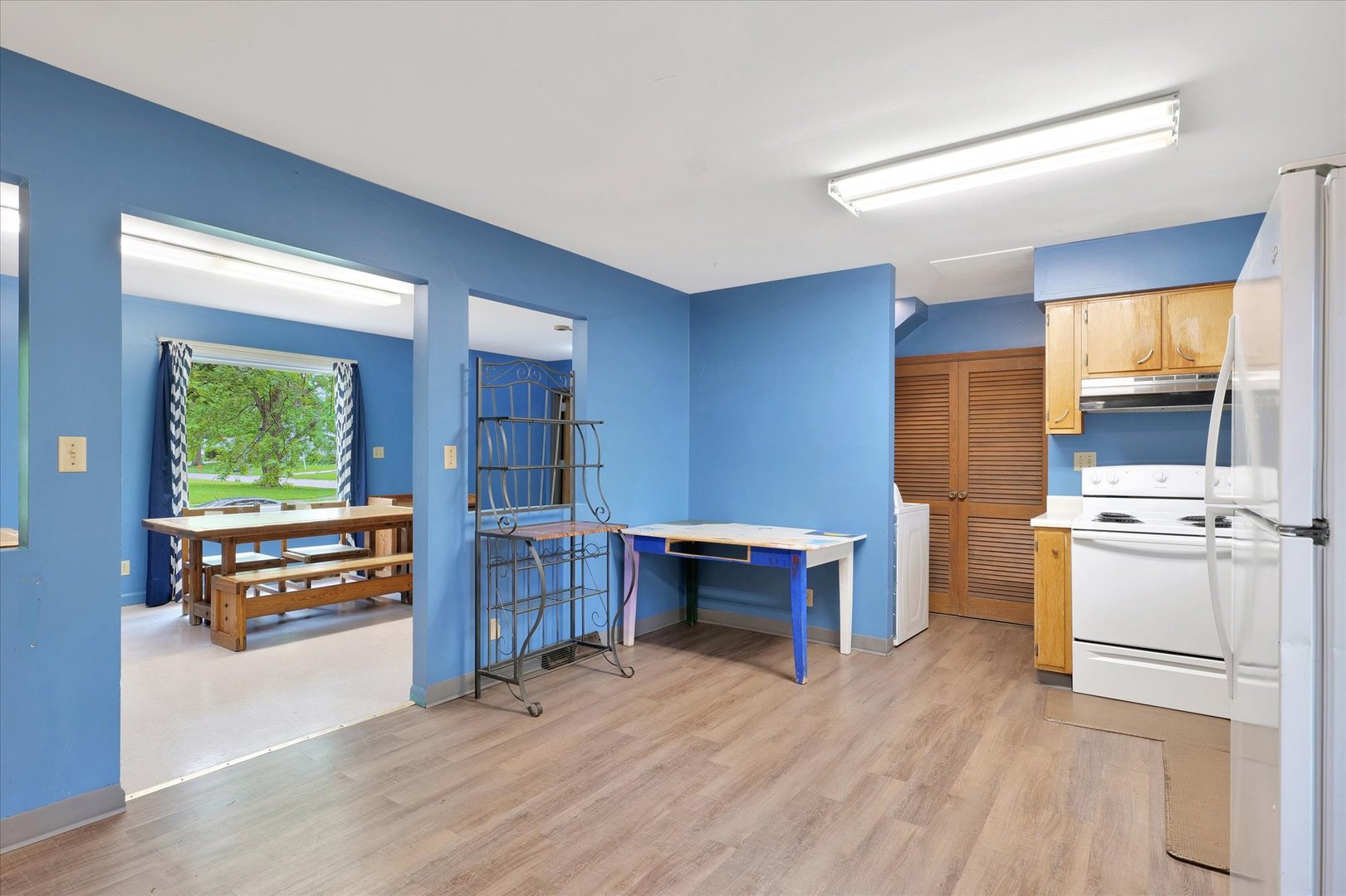 1705 Georgetown Drive Champaign, IL 61821 - Photo 13 of 44 a kitchen with a refrigerator and a stove top oven