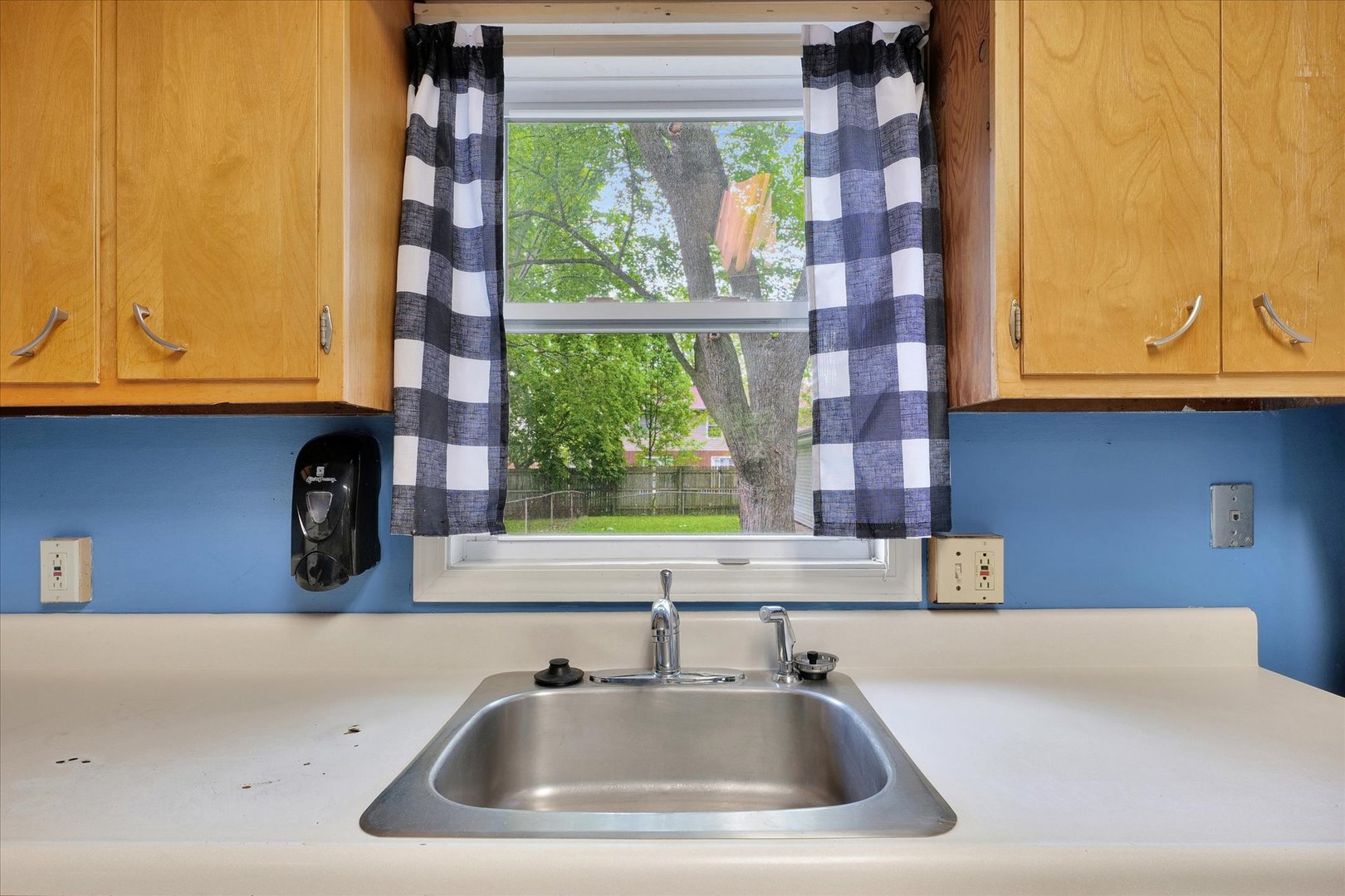 1705 Georgetown Drive Champaign, IL 61821 - Photo 15 of 44 a bathroom with a sink and a large window