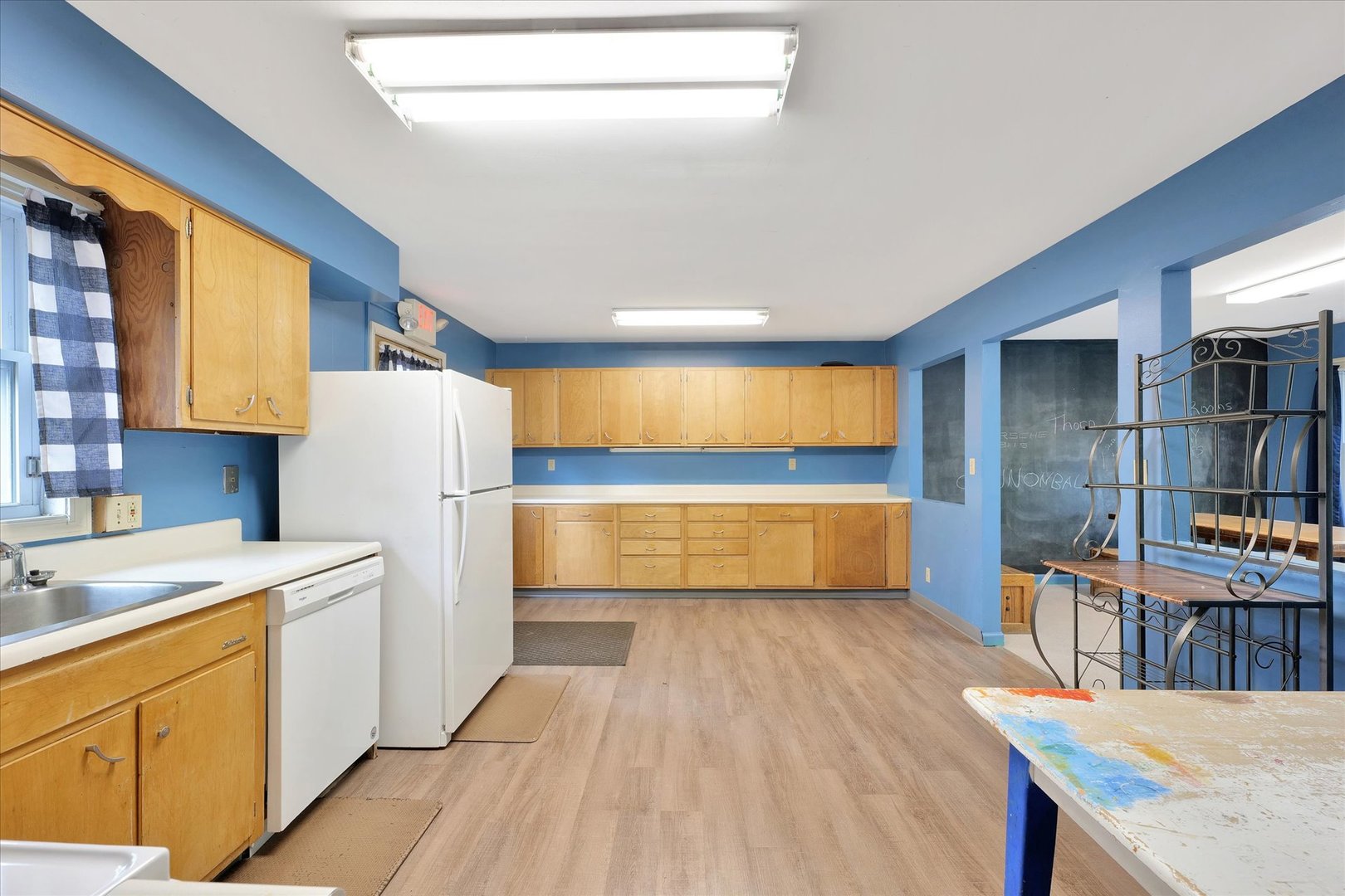 1705 Georgetown Drive Champaign, IL 61821 - Photo 16 of 44 a kitchen with stainless steel appliances a refrigerator and a sink