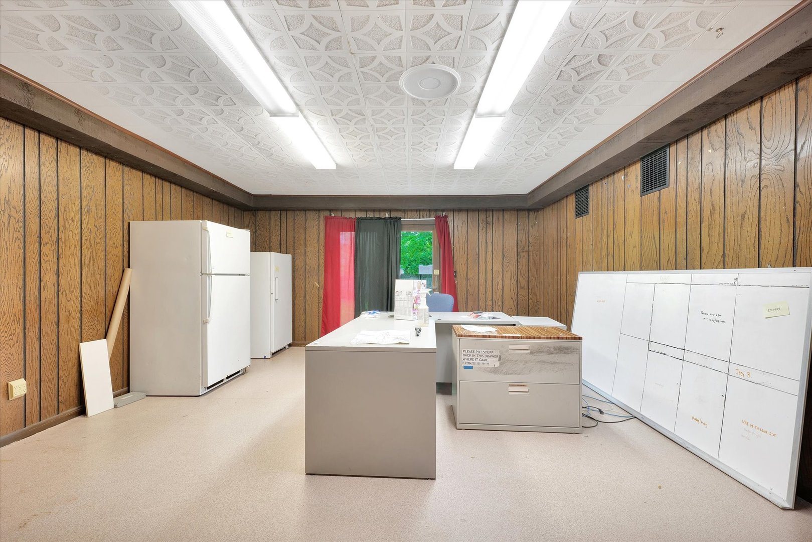1705 Georgetown Drive Champaign, IL 61821 - Photo 19 of 44 a living room with furniture and a large window