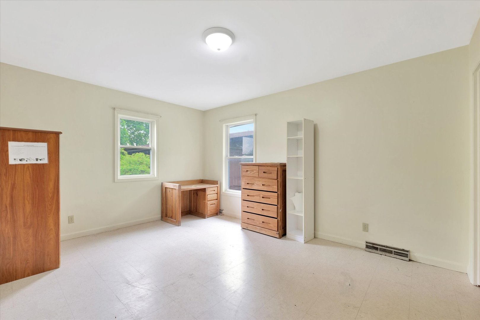 1705 Georgetown Drive Champaign, IL 61821 - Photo 28 of 44 an empty room with furniture and a window