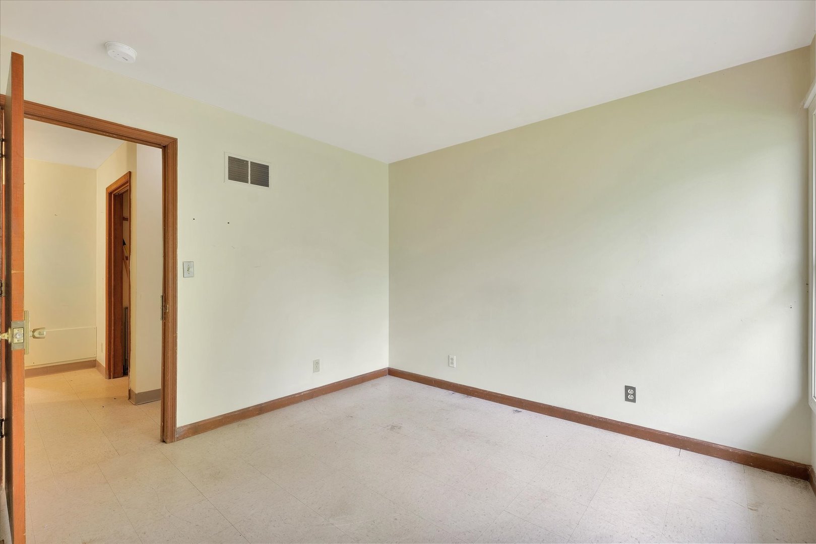 1705 Georgetown Drive Champaign, IL 61821 - Photo 33 of 44 an empty room with a bench
