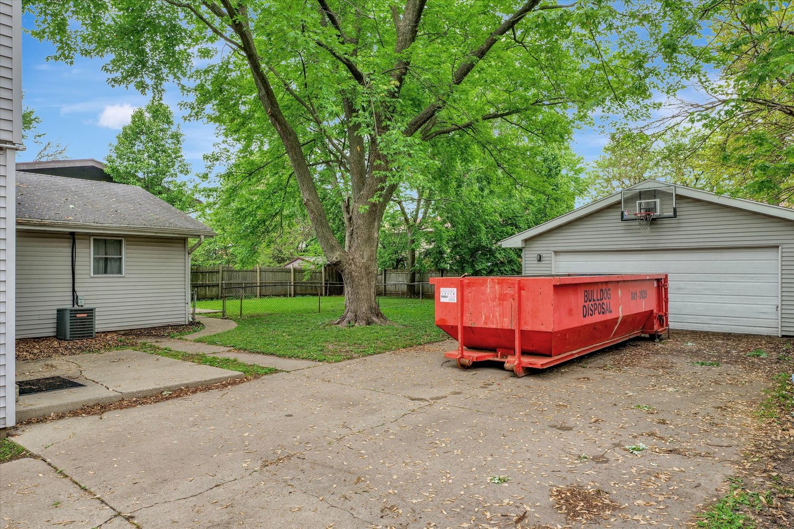 1705 Georgetown Drive Champaign, IL 61821 - Photo 38 of 44 a backyard of a house with a garden and deck