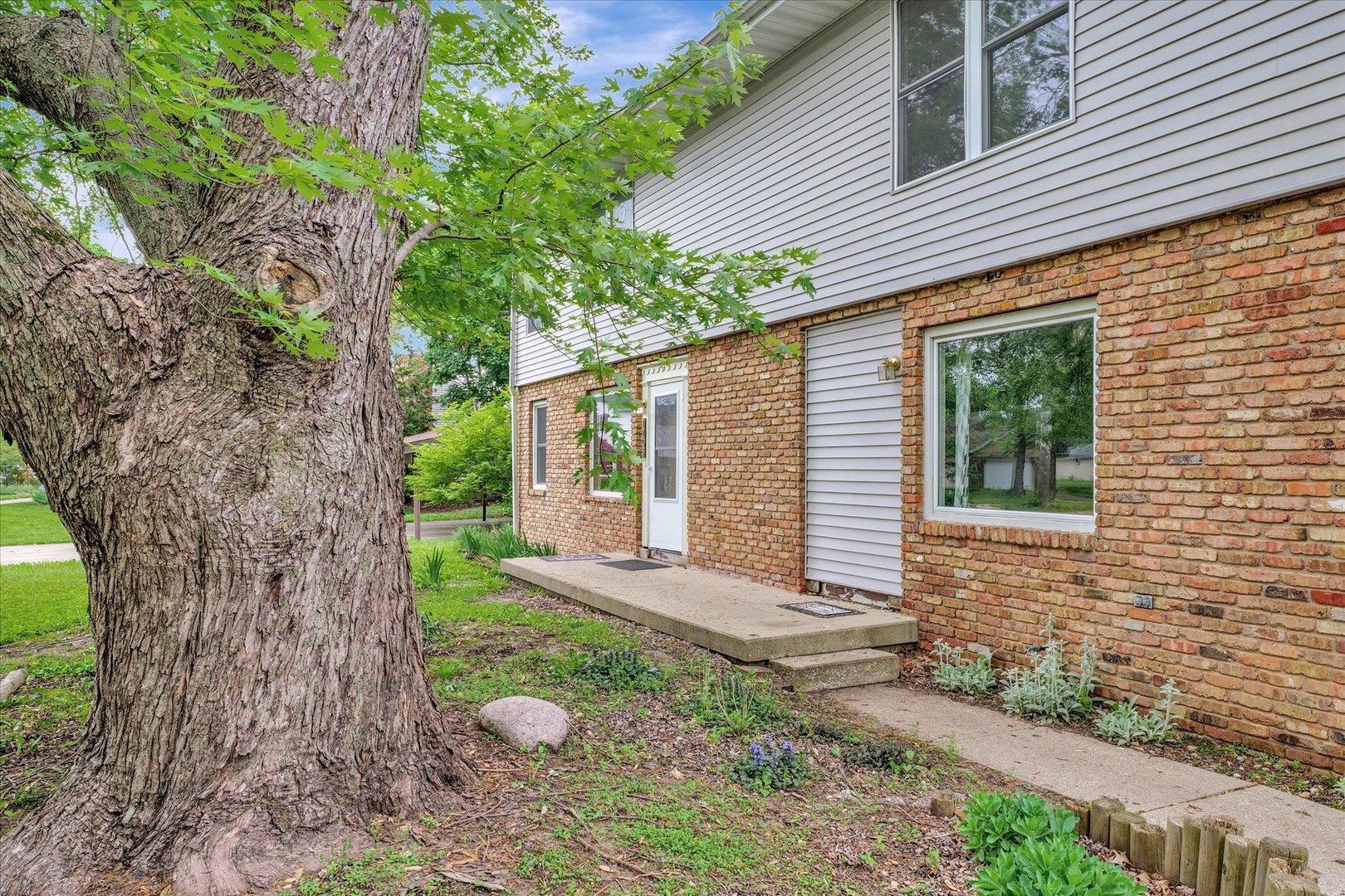 1705 Georgetown Drive Champaign, IL 61821 - Photo 4 of 44 a backyard of a house with seating space