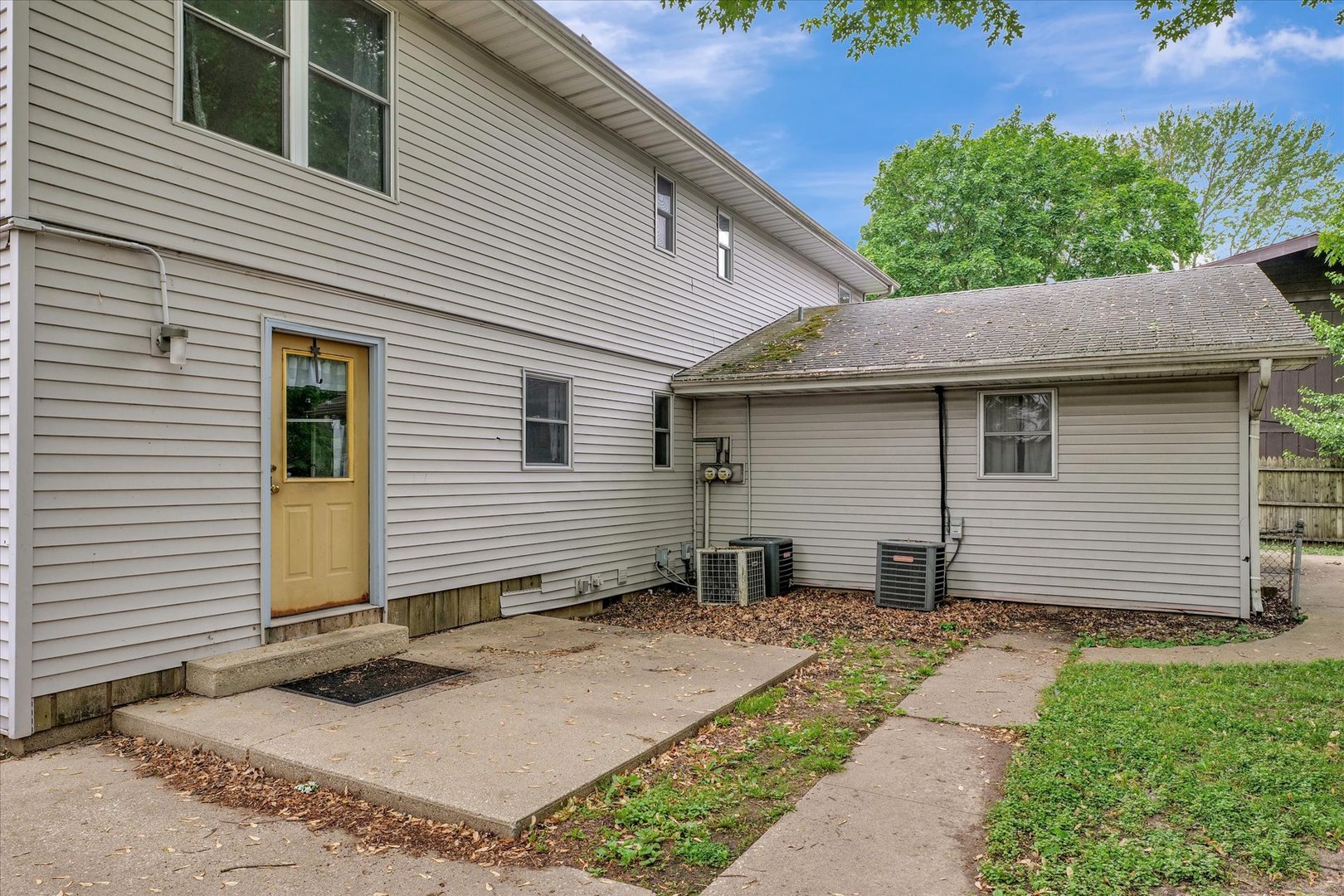 1705 Georgetown Drive Champaign, IL 61821 - Photo 42 of 44 a view of a house with a yard