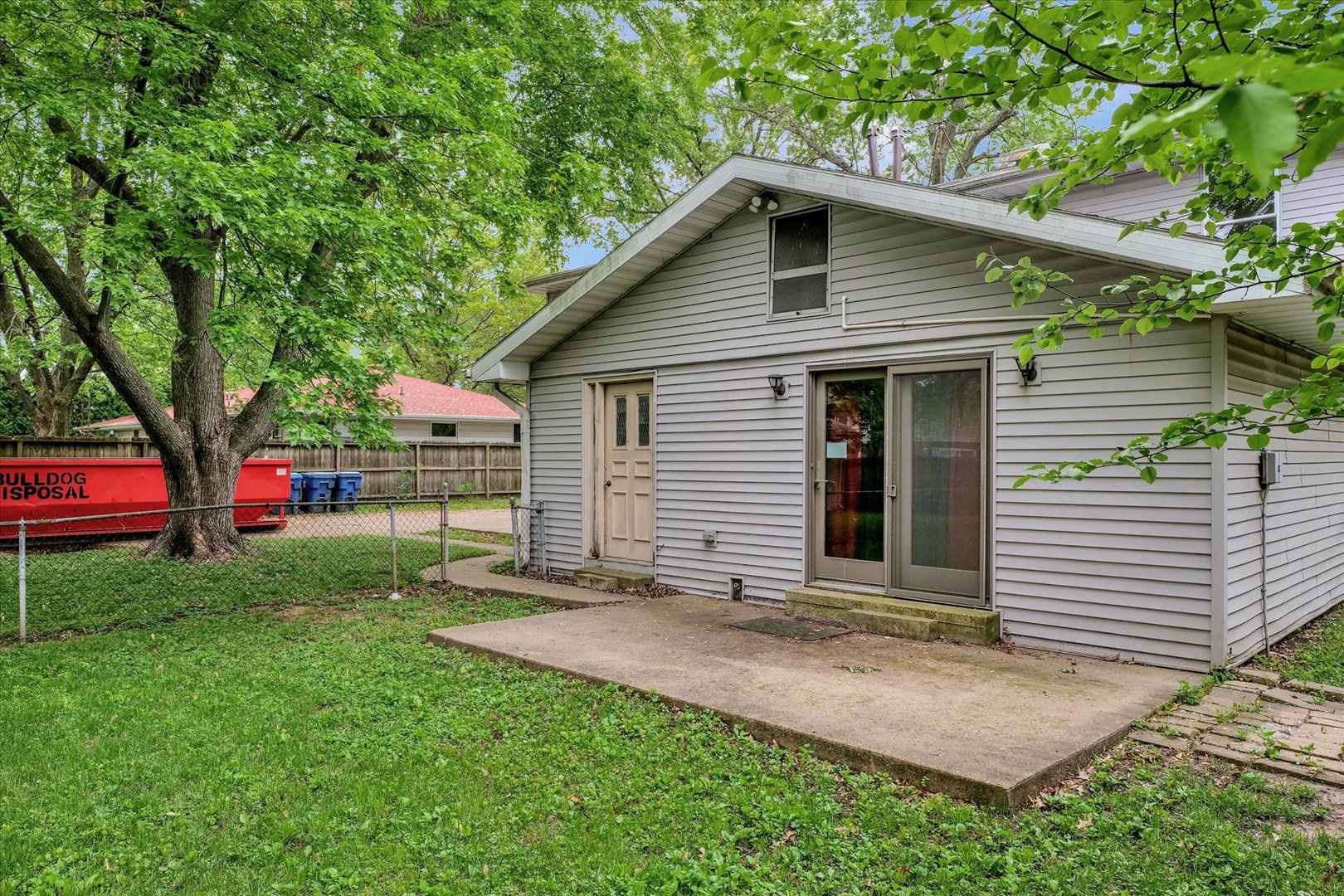 1705 Georgetown Drive Champaign, IL 61821 - Photo 43 of 44 a front view of a house with a yard and trees