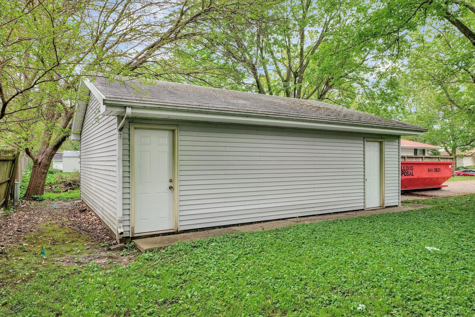 1705 Georgetown Drive Champaign, IL 61821 - Photo 44 of 44 a small barn with a small yard and wooden fence