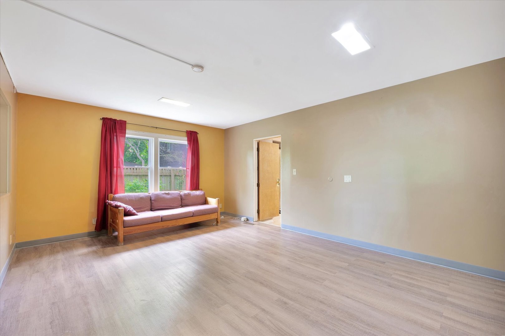1705 Georgetown Drive Champaign, IL 61821 - Photo 7 of 44 a living room with furniture and a large window
