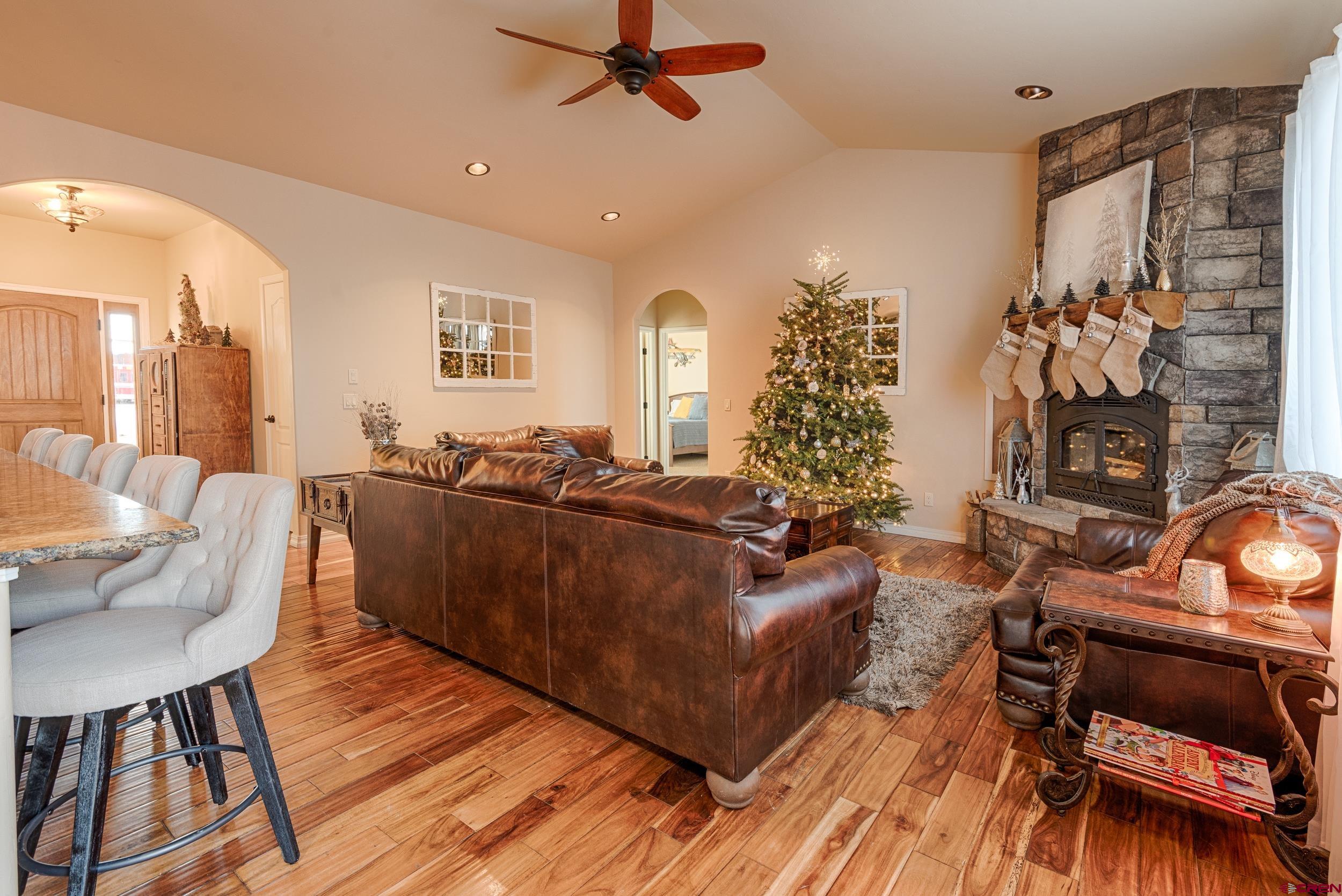 13287 6160th Road Montrose, CO 81403 - Photo 20 of 35 a living room with furniture and a flat screen tv