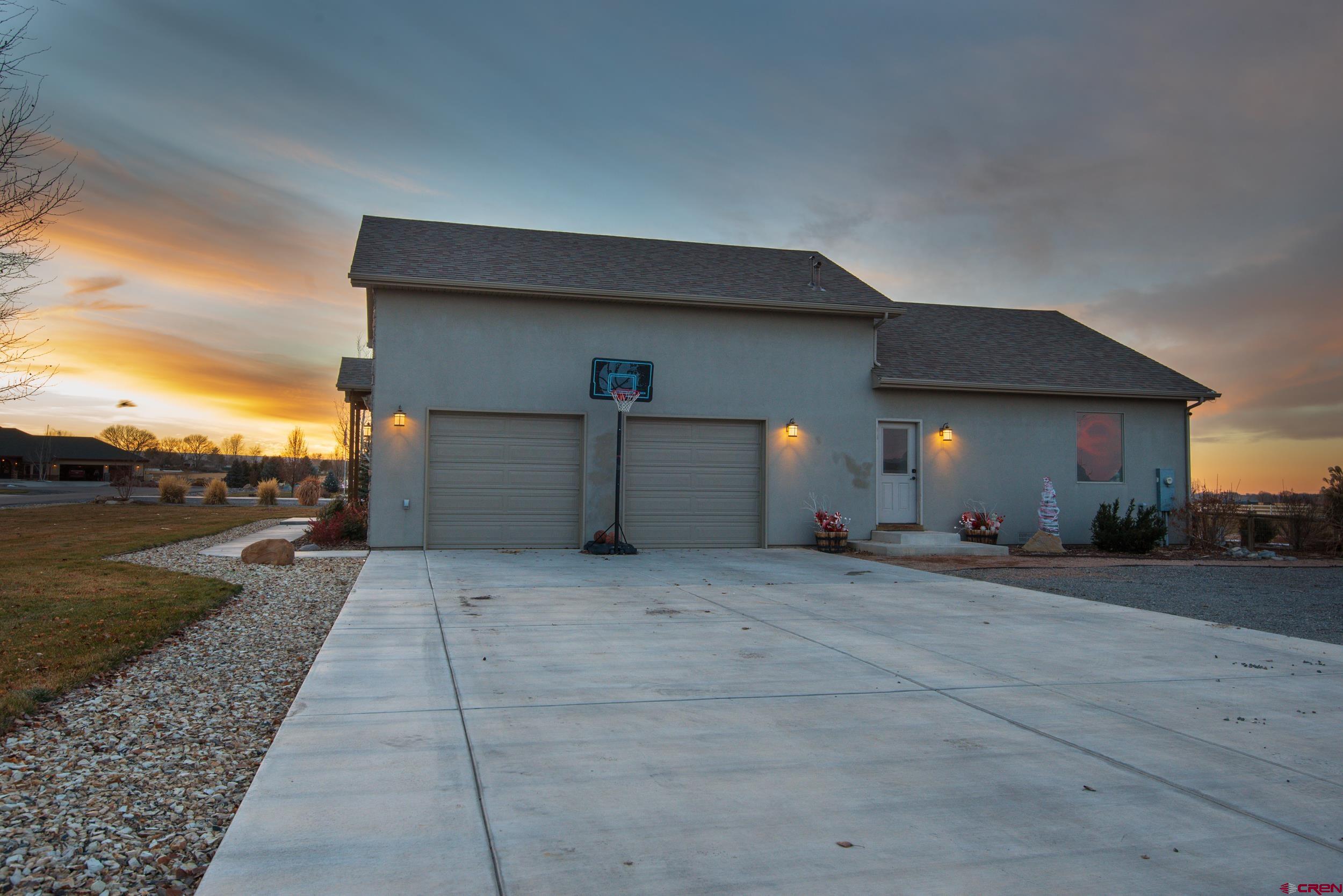 13287 6160th Road Montrose, CO 81403 - Photo 27 of 35 a view of a house with a yard