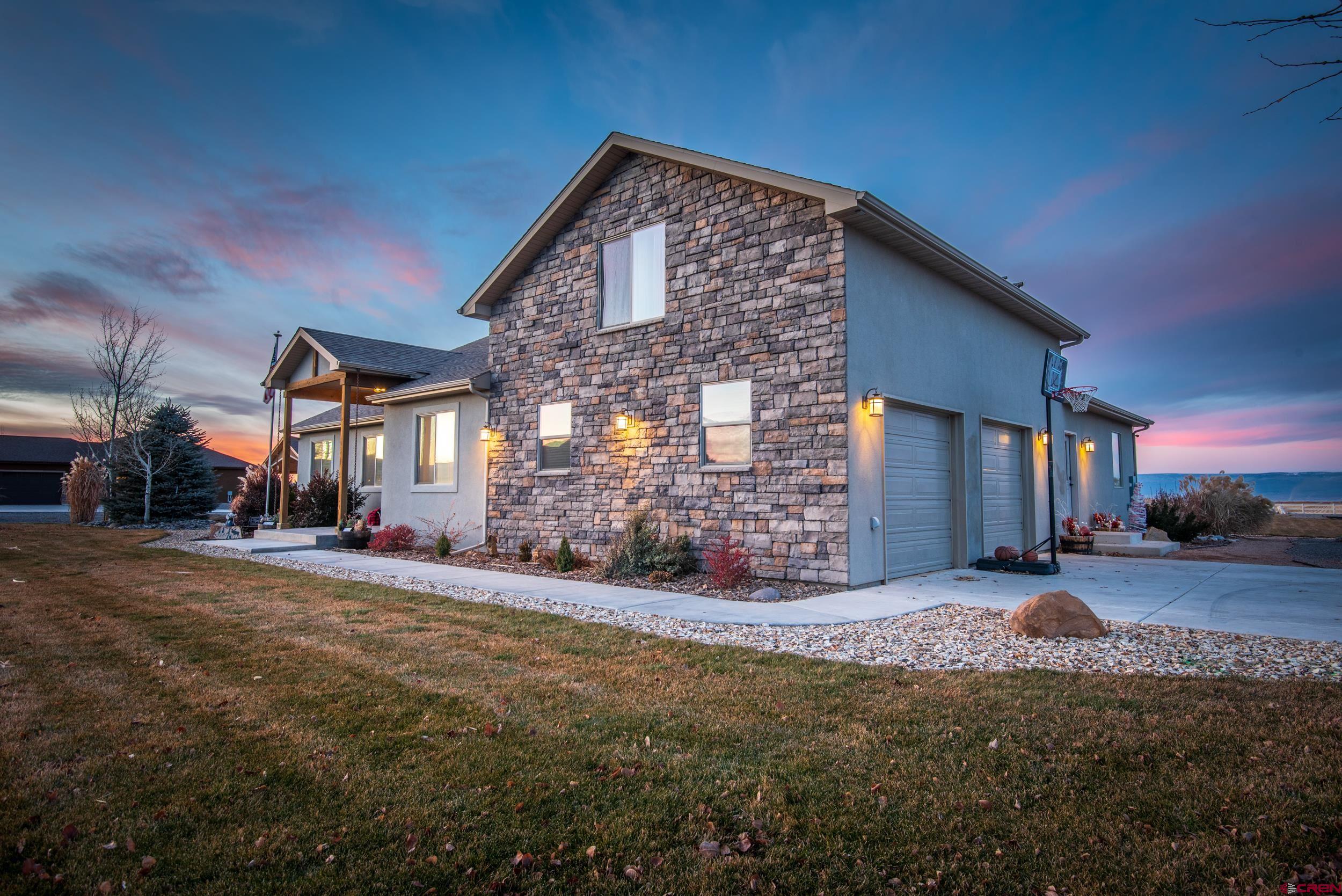 13287 6160th Road Montrose, CO 81403 - Photo 35 of 35 a view of a house with a yard