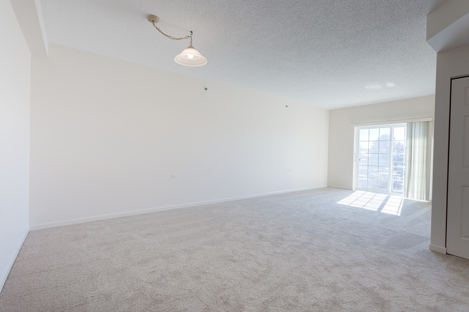 2000 Randi Drive, Unit 311 Aurora, IL 60504 - Photo 18 of 19 an empty room with windows
