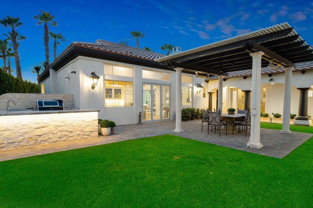 56495 Mountain La La Quinta, CA 92253 - Photo 11 of 56 a view of a porch with chairs and backyard