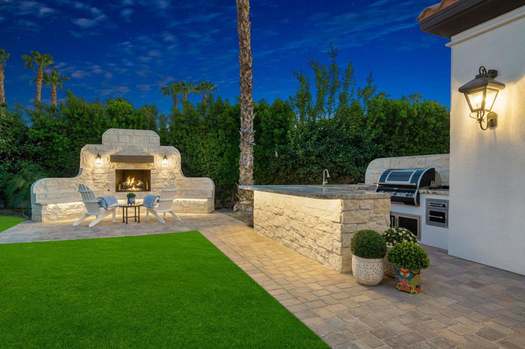 56495 Mountain La La Quinta, CA 92253 - Photo 13 of 56 a front view of a house with a garden and sitting area