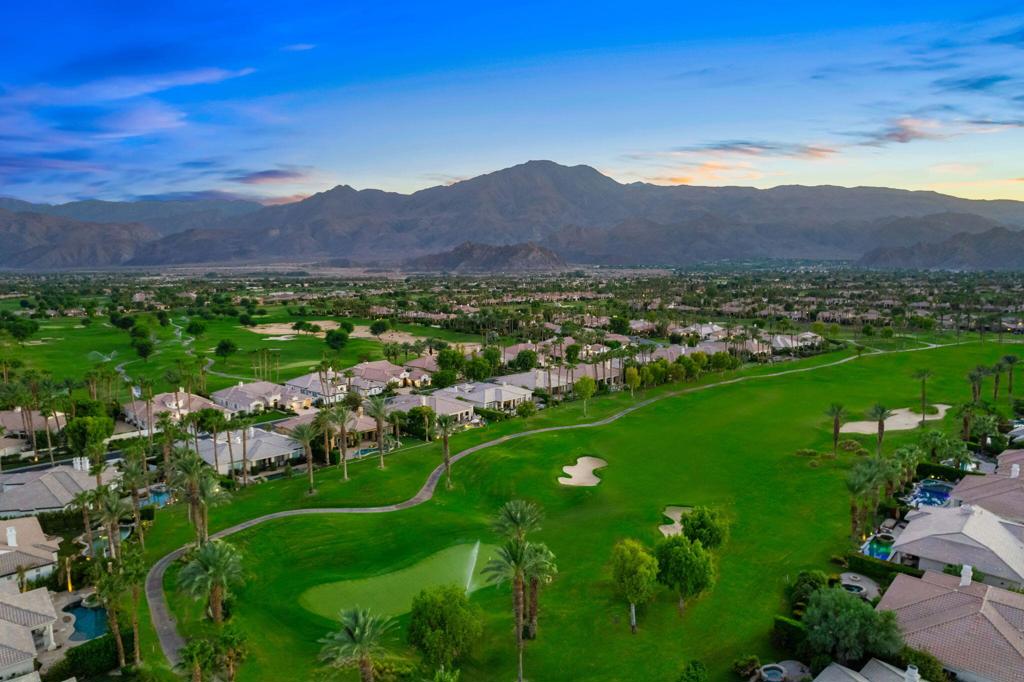 56495 Mountain La La Quinta, CA 92253 - Photo 22 of 56 a view of a lush green hillside and houses