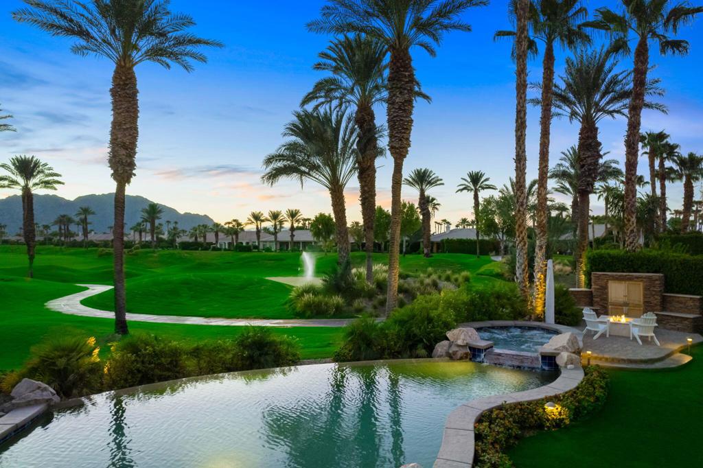 56495 Mountain La La Quinta, CA 92253 - Photo 23 of 56 a view of a swimming pool and lounge chairs