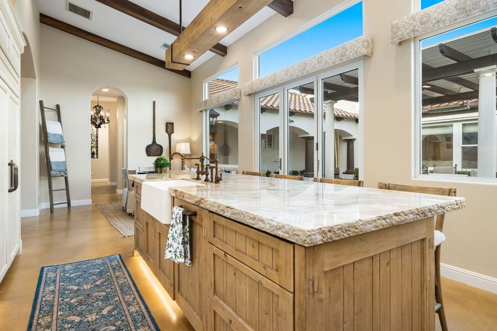 56495 Mountain La La Quinta, CA 92253 - Photo 37 of 56 a bathroom with a granite countertop sink and a mirror