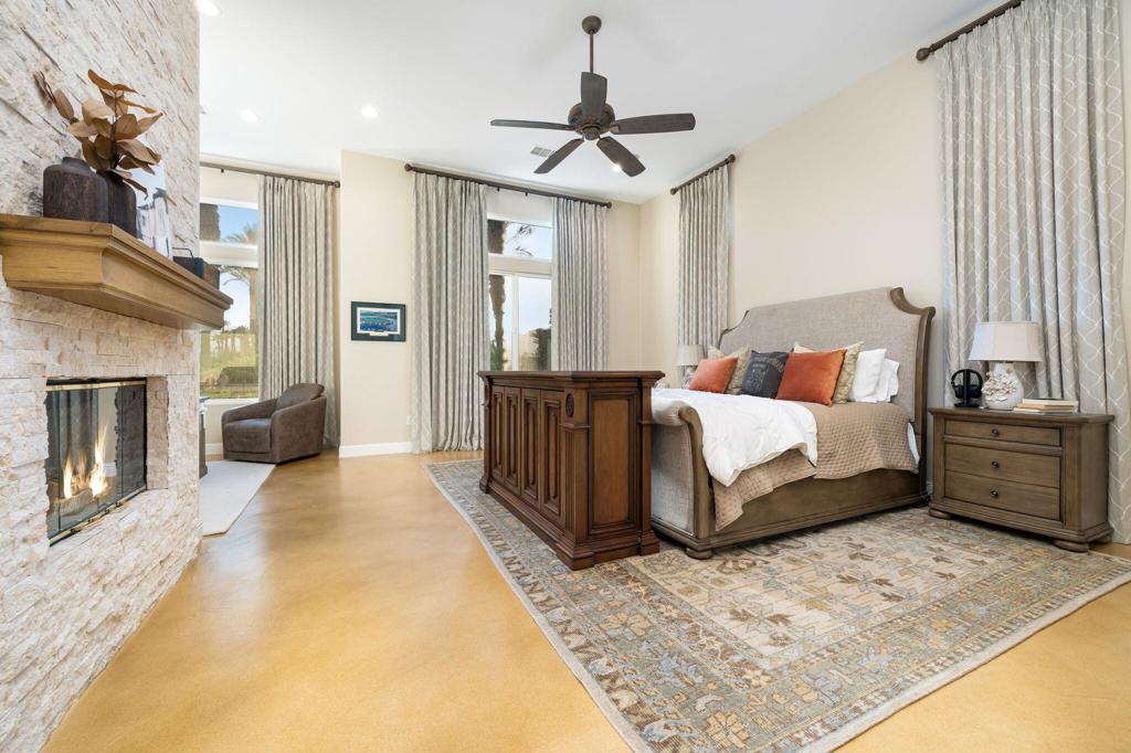 56495 Mountain La La Quinta, CA 92253 - Photo 40 of 56 a bedroom with a bed and a couch