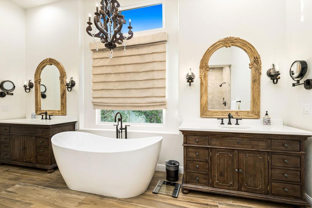 56495 Mountain La La Quinta, CA 92253 - Photo 43 of 56 a bathroom with a sink and a mirror