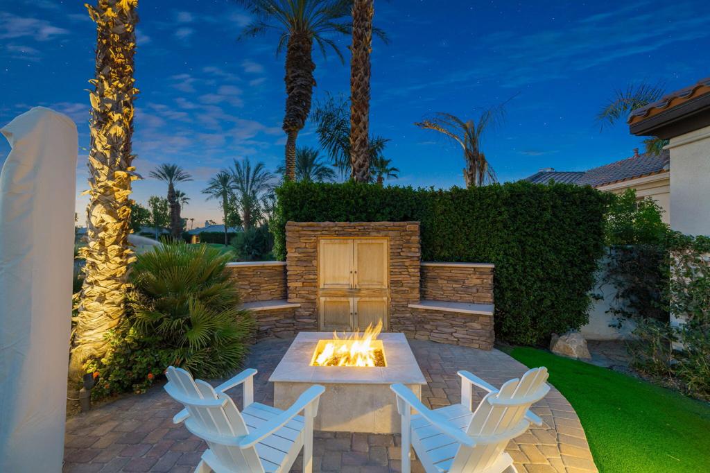 56495 Mountain La La Quinta, CA 92253 - Photo 6 of 56 a view of a chairs and table in back yard of the house