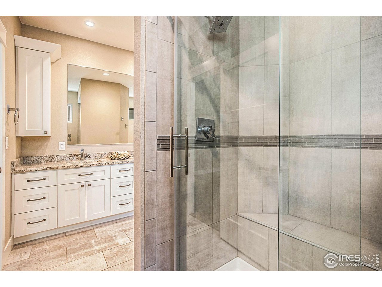 1100 Johnson Street Wiggins, CO 80654 - Photo 11 of 34 a bathroom with a shower and a sink