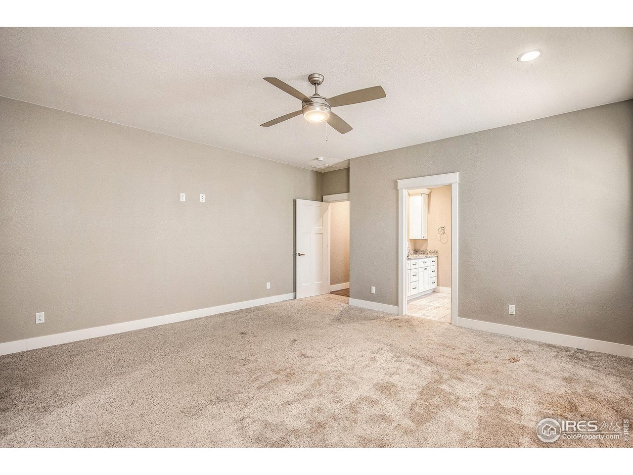 1100 Johnson Street Wiggins, CO 80654 - Photo 14 of 34 a view of an empty room and window
