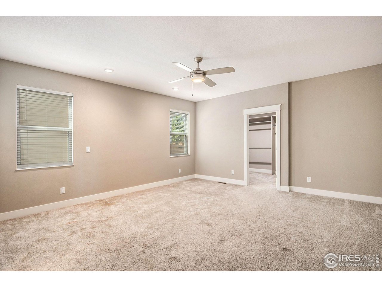 1100 Johnson Street Wiggins, CO 80654 - Photo 15 of 34 a view of an empty room with a window