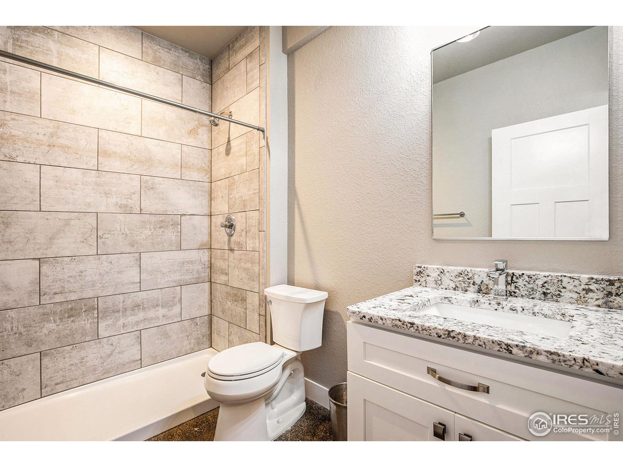 1100 Johnson Street Wiggins, CO 80654 - Photo 23 of 34 a bathroom with a sink a toilet and shower