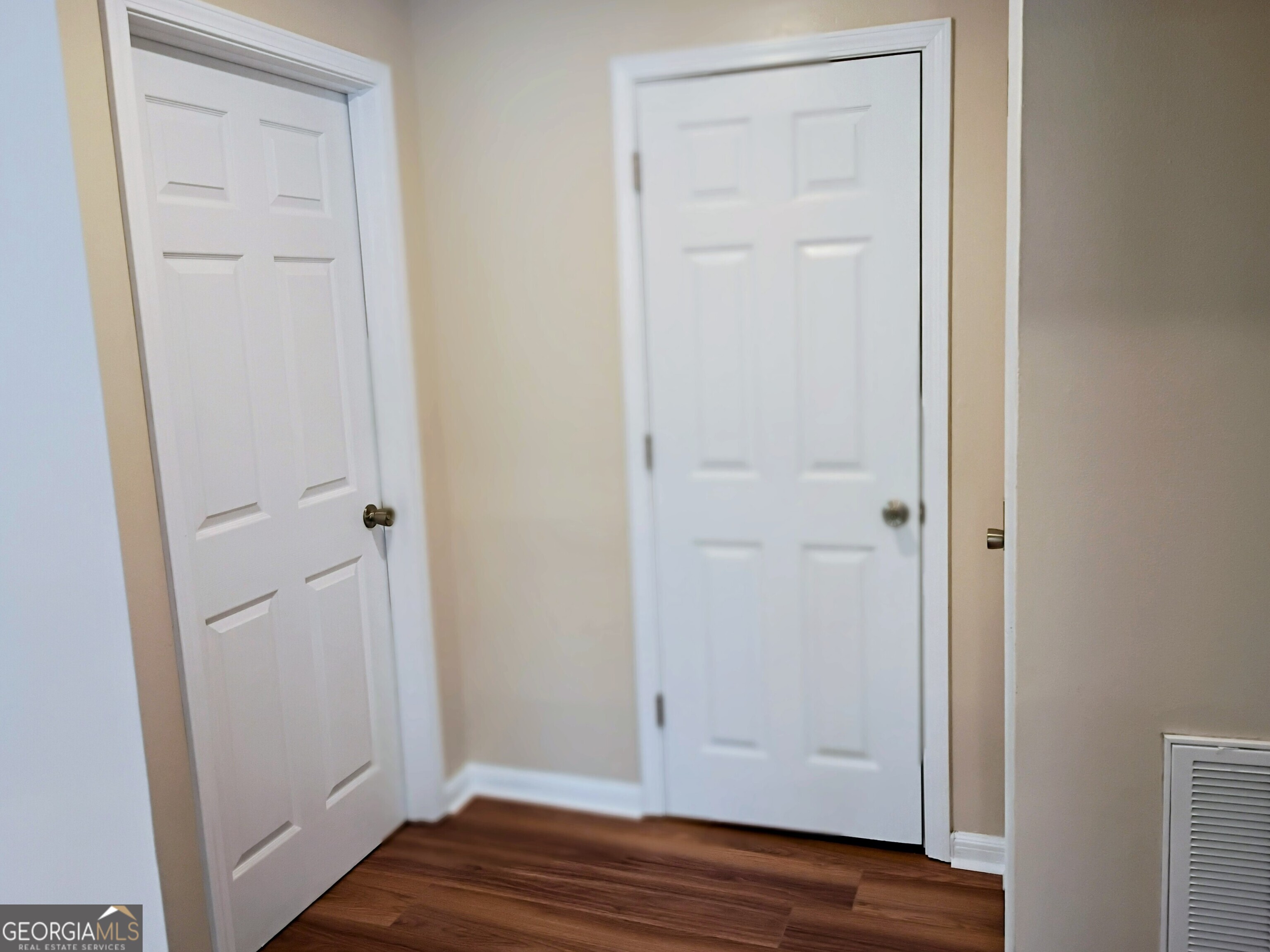 624 Thompson Road Swainsboro, GA 30401 - Photo 11 of 20 a view of empty room with wooden floor