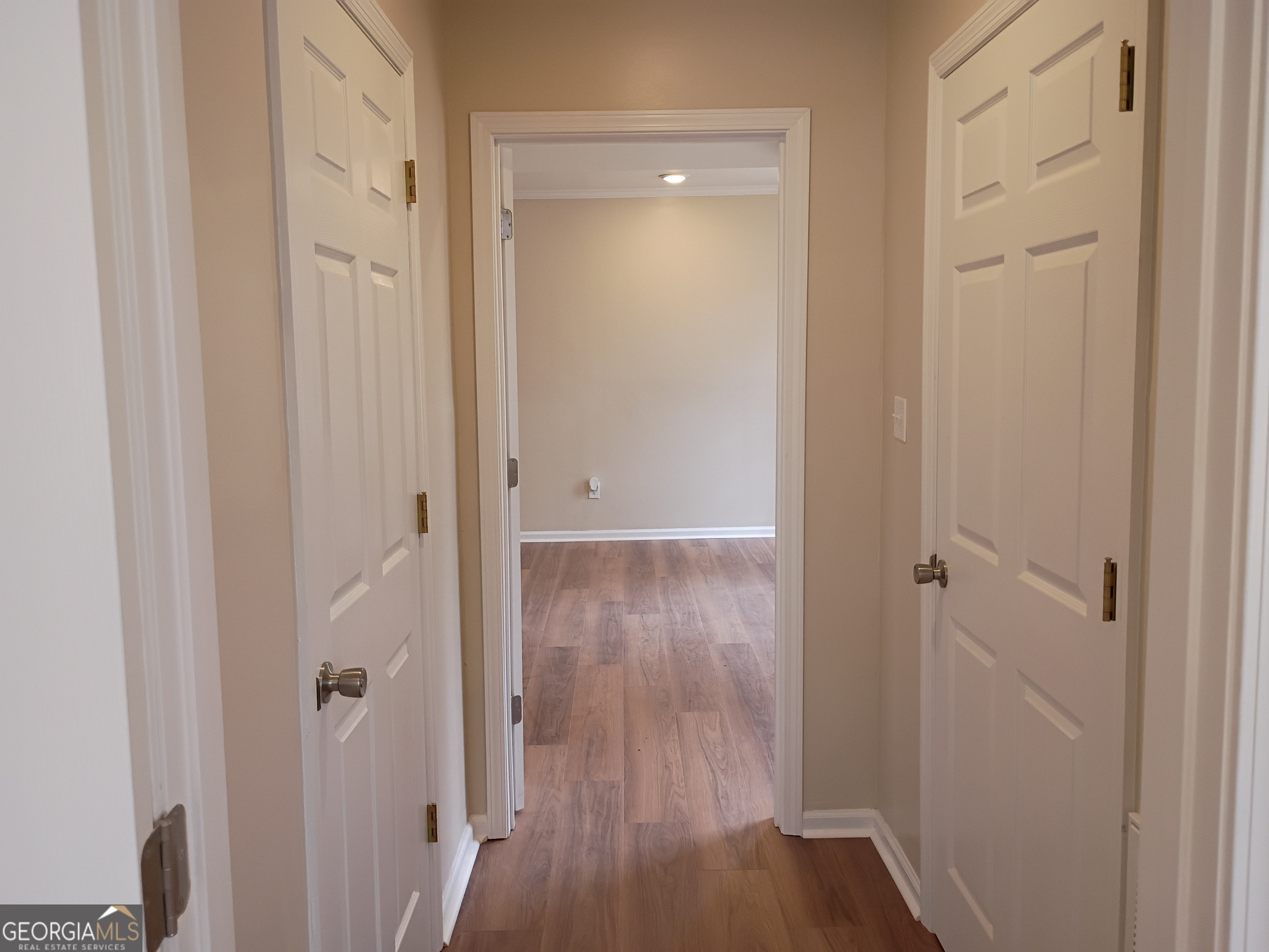 624 Thompson Road Swainsboro, GA 30401 - Photo 15 of 20 a view of a hallway with wooden floor