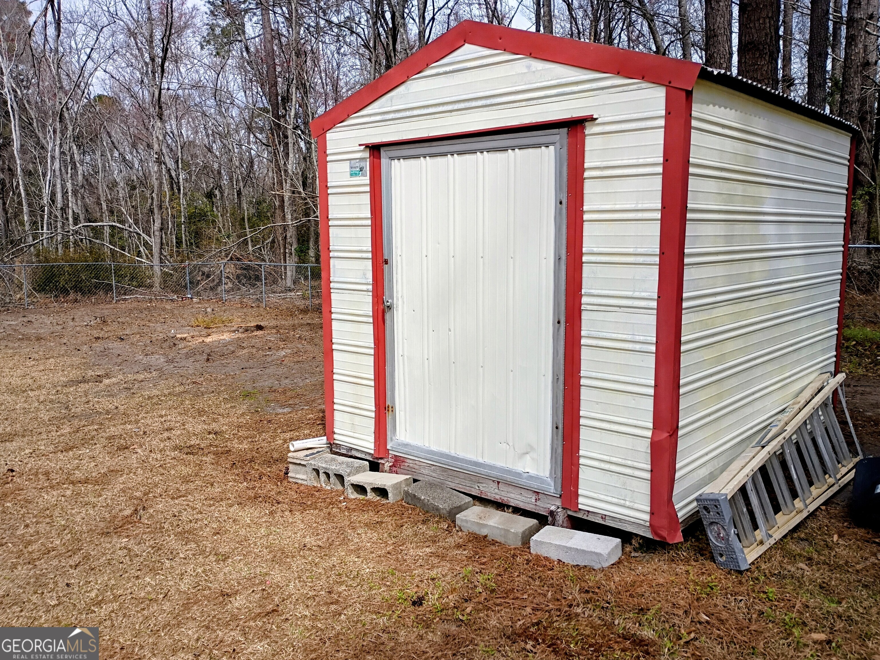 624 Thompson Road Swainsboro, GA 30401 - Photo 20 of 20 a front view of a house with a yard