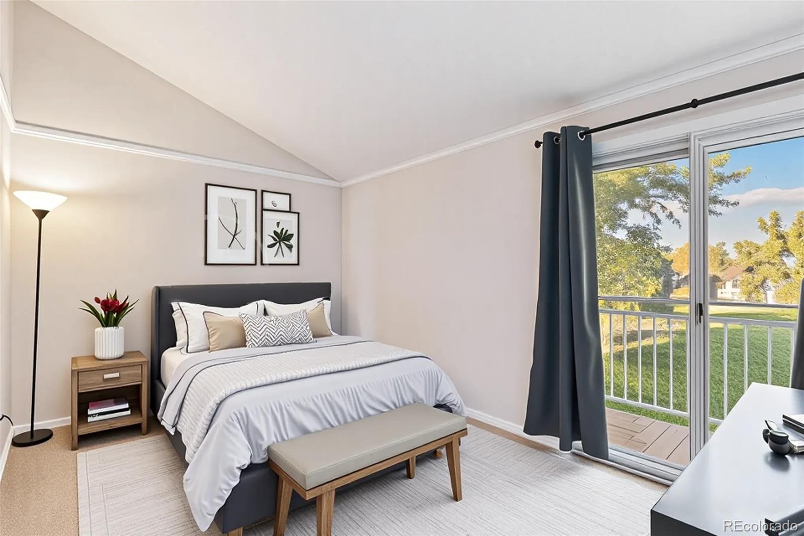 4262 East Maplewood Way Centennial, CO 80121 - Photo 6 of 32 a bedroom with a bed and a large window