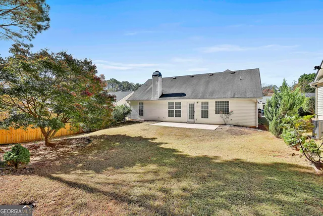 a bathroom with a sink and a yard