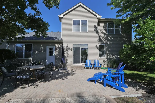 a view of house with outdoor seating space