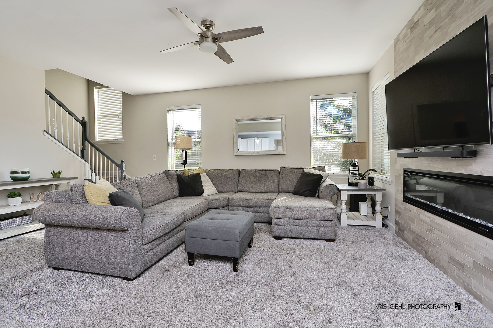 2800 Sweet Clover Way Wauconda, IL 60084 - Photo 9 of 32 a living room with furniture and a flat screen tv